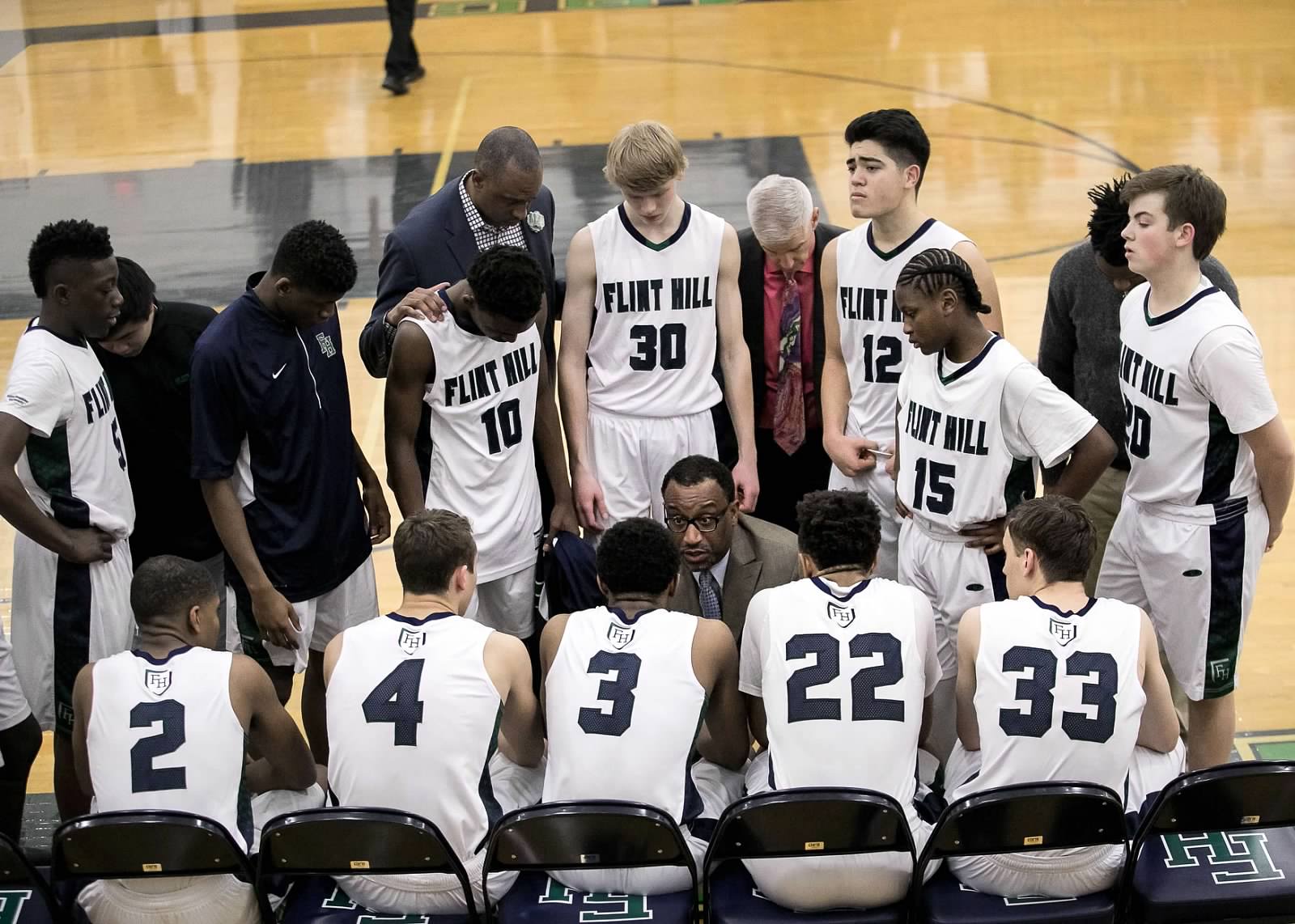 The boy's varsity basketball team competed at Winterfest under the guidance of Coach Reed.
