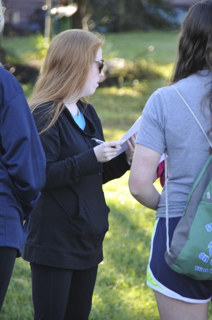 Molly Tanner, Upper School Service Coordinator, discusses the day's events.