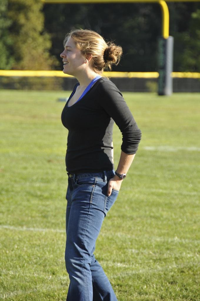 Senior Carlin Pierce watches the games from the sidelines. 