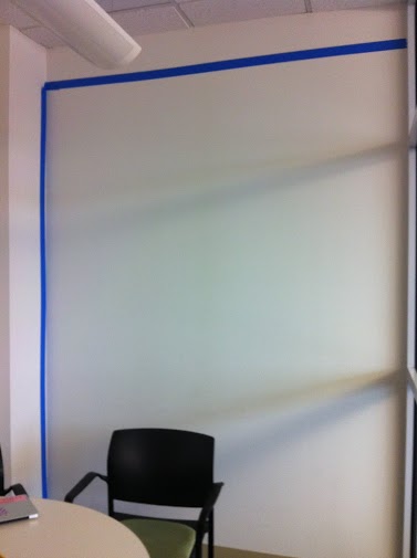 An example of the new whiteboard paint inn one of the cubicles