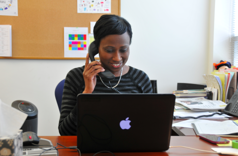 Mia Burton, the new Director of Diversity and Inclusion, answers a phone call.