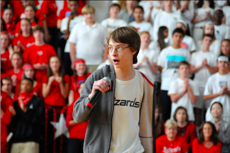 Kyle Wallace sings at the 2014 Homecoming Pep Rally.