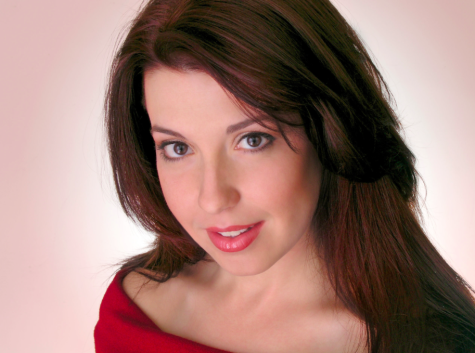 Sarah Pramstaller, a nationally recognized performer, poses for her headshot. Photo Credit: sarahpramstaller.com.