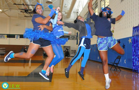 Juniors Uchenna Nckenchor, Sydney Britton, Taylor Lucas, and Tamika Alexander jump for joy before the Pep Rally.