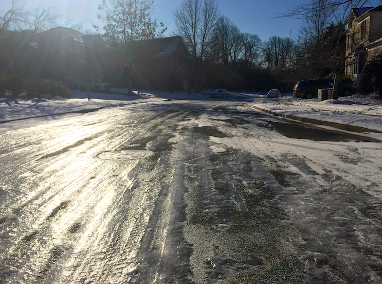 As seen in this photo from a Vienna neighborhood on the morning of Thursday, January 8, 2015, roads remained visibly icy as Flint Hill made the decision to stay open despite an FCPS closure. 