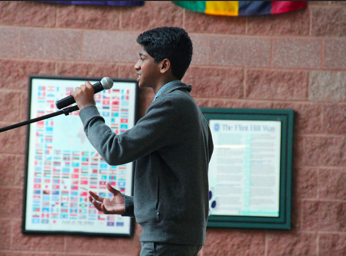 Freshman Amrith Kumar, one of the competitions finalists, confidently delivers his poem. 
