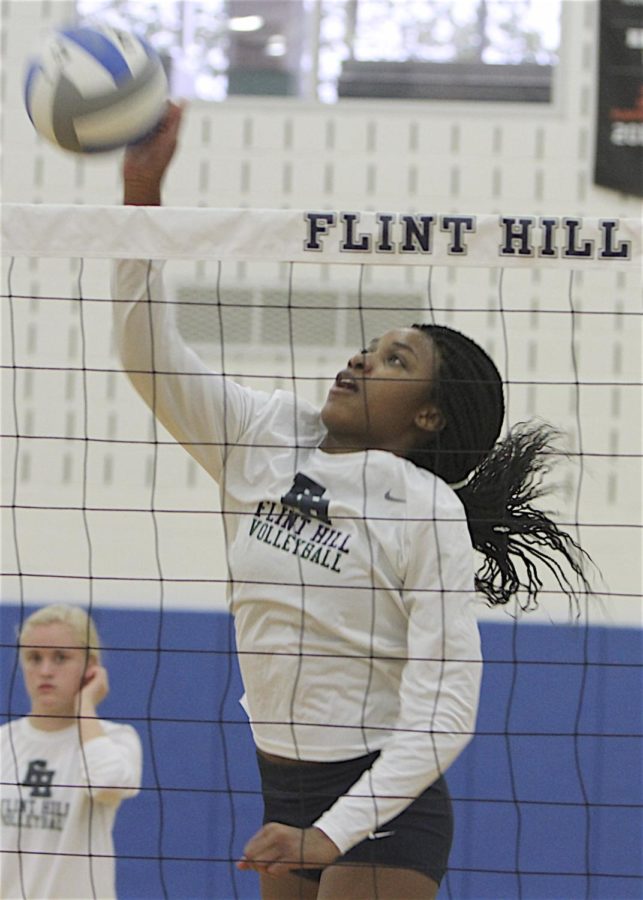 Senior Siron Hardy kills the ball. Hardy has committed to play Division 1 volleyball at George Mason University.