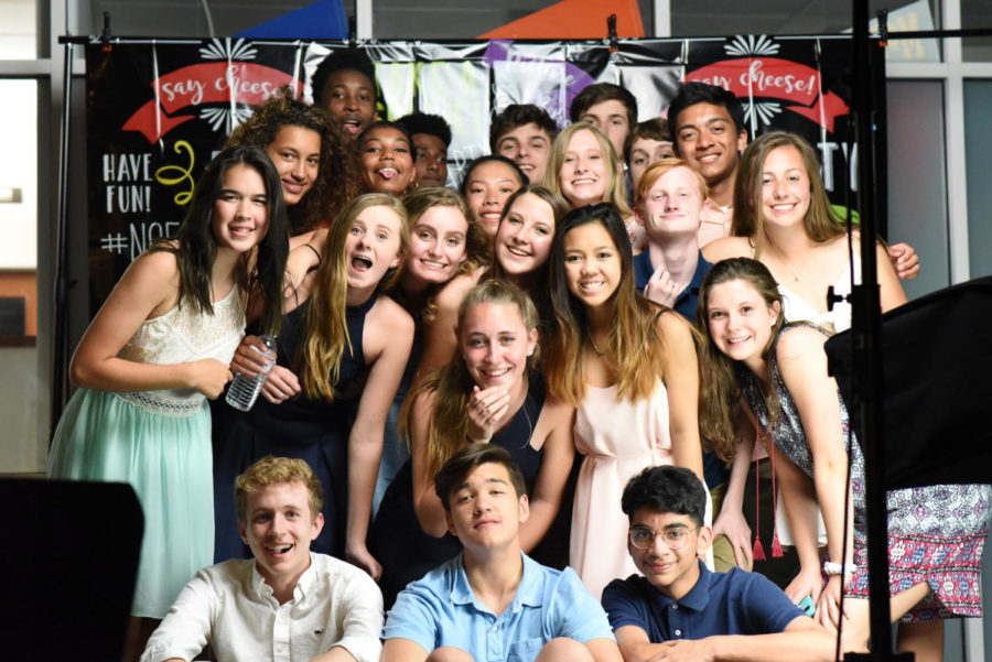 Students at the Sadies Dance on Friday April 20th pose in front of the new photo booth, run by junior Sebastian Aguilar. 