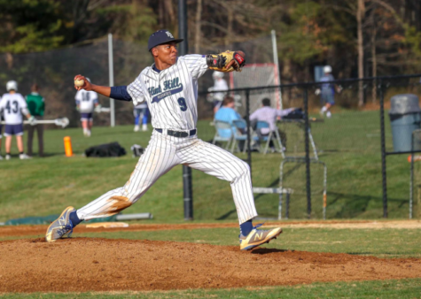 Varsity Boys Baseball player Justin Taylor pitches.
