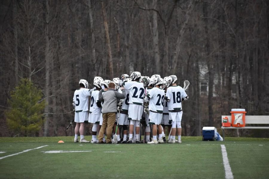 Flint+Hill+Varsity+Boys+Lacrosse+huddles+along+the+side+line
